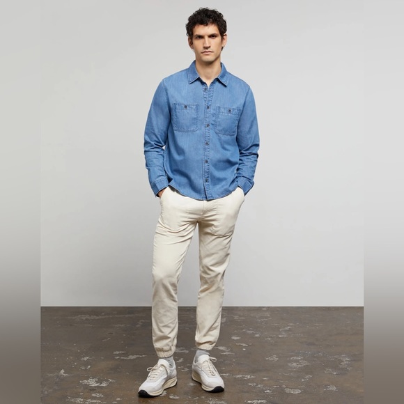 The onia corduroy jogger has flat front with zipper and drawcord waist. In Swan - Picture 2 of 4